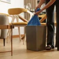 person taking out their trash